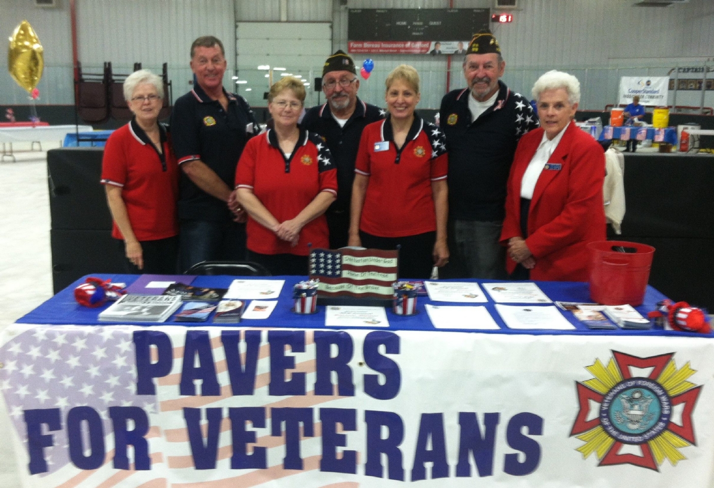 VFW and Auxiliary members distribute paver applications during this event.